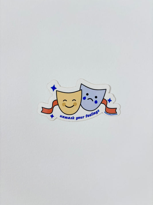 Cartoon crying face sticker with blue tears and banner text "embrace your feelings"