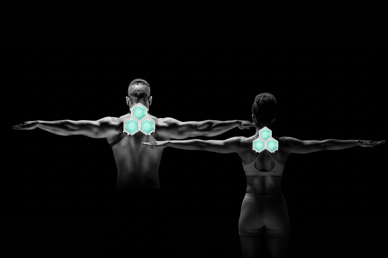 Person with a futuristic hexagonal chest piece on a black background